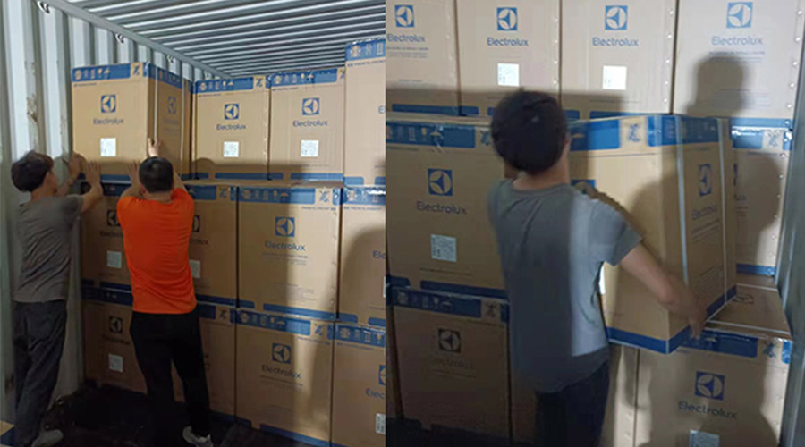 金環(huán)電器工作人員齊心協力完成伊萊克斯客戶的干衣機裝柜